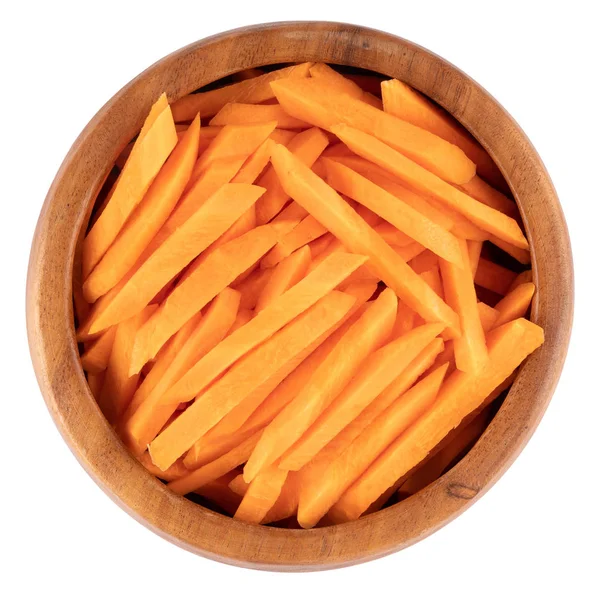 Carrot sticks in wooden bowl. Stock Picture