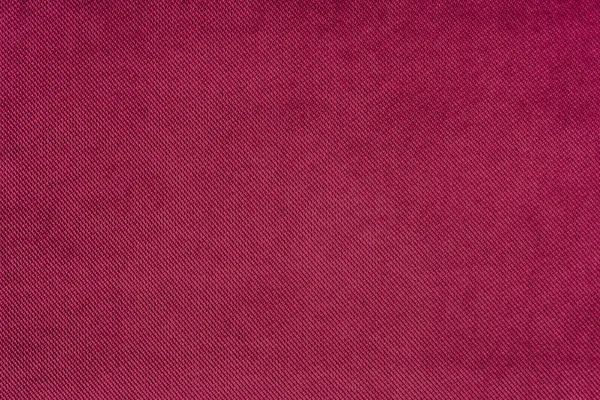 Red fabric background texture. Red cloth.