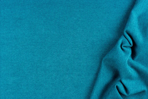 Textura de tela azul brillante con pliegues. — Foto de Stock