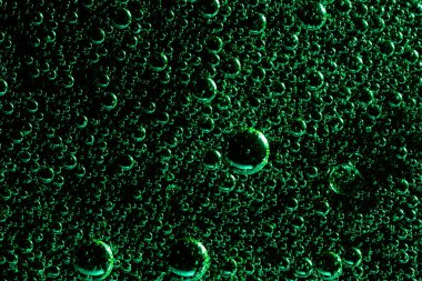 Petrol çemberli soyut yeşil arka plan. Su kabarcıkları yaklaşıyor. . 