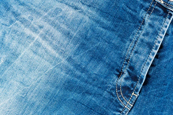 Fondo de desgaste de algodón, telón de fondo vaqueros azul denim — Foto de Stock