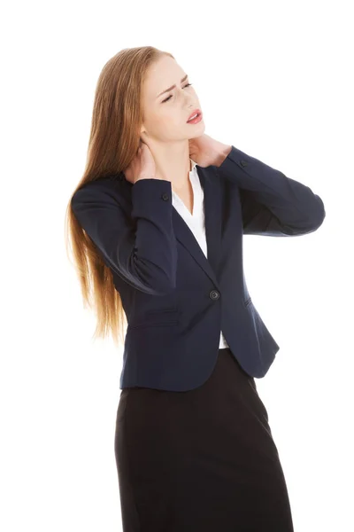 Beautiful caucasian business woman touching her neck. — Stock Photo, Image