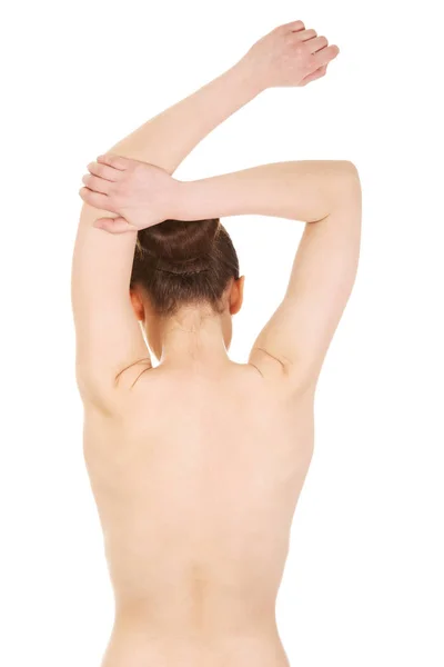 Topless kvinna sträcker armarna. — Stockfoto