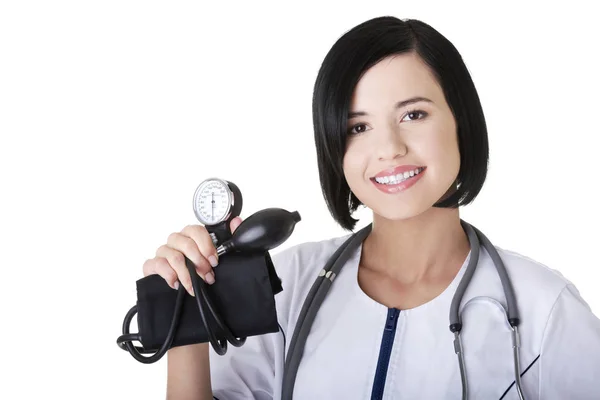Mulher médico com medidor de pressão — Fotografia de Stock