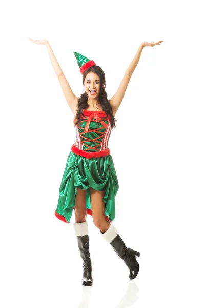 Mulher de comprimento total com as mãos para cima usando roupas de elfo — Fotografia de Stock