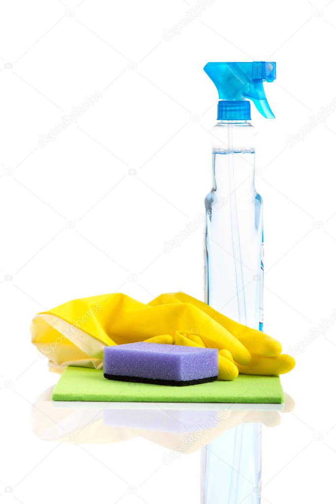 Photo of house cleaning materials. Items include sponge, rubber gloves.