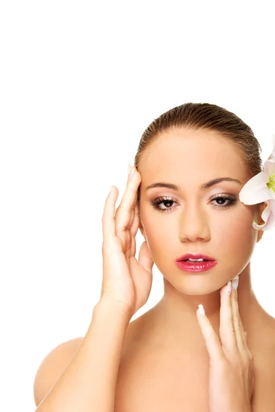 Beautiful spa woman with lily. — Stock Photo, Image