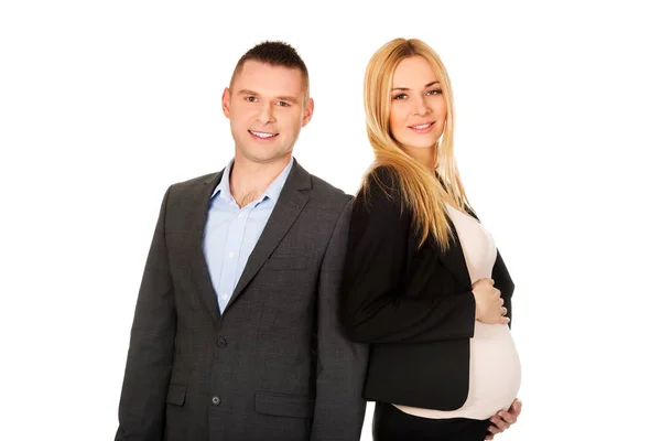 Pregnant businesswoman with her partner — Stock Photo, Image