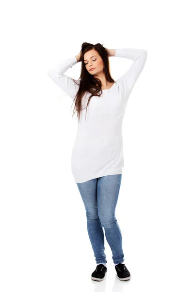 Young beautiful woman massaging her own hairs — Stock Photo, Image