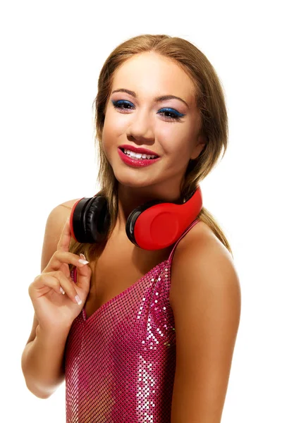 音楽を聴くヘッドフォンを持つパーティー女性. — ストック写真