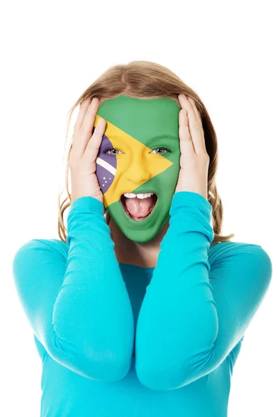 Bandera brasileña pintada en cara de mujer . — Foto de Stock