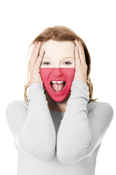 Mujer con bandera polaca en la cara . — Foto de Stock