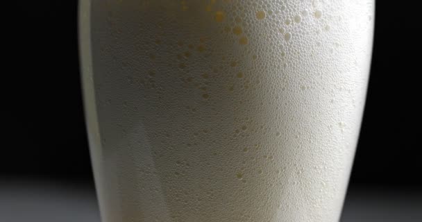 Close up on beer foam — Stock Video