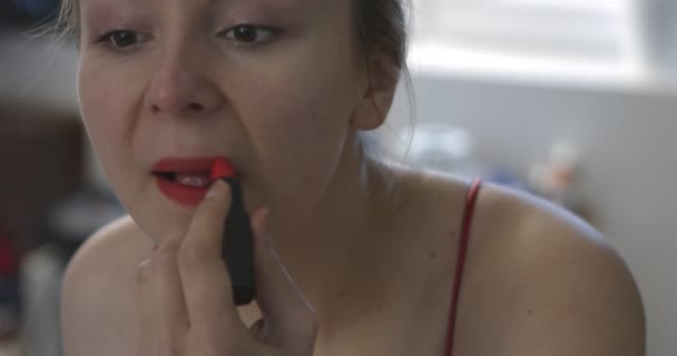 Woman using red lipstick — Stock Video