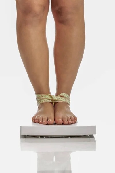 Diet concept, fat woman on weight — Stock Photo, Image