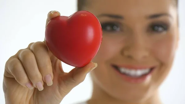 Red heart in nurses hands. — Stock Photo, Image