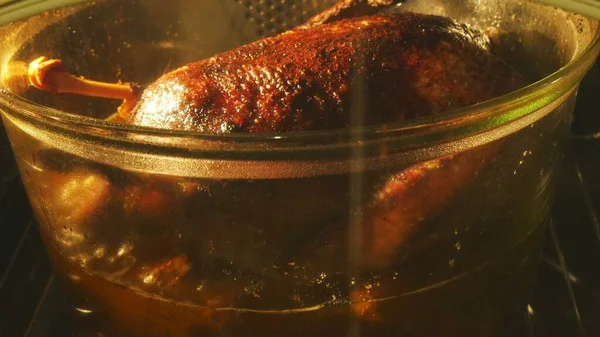 Full goose cooking in roaster — Stock Photo, Image