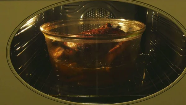 Full goose cooking in roaster — Stock Photo, Image