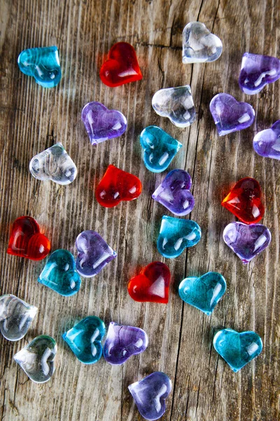 Multicolored Glass Hearts Old Wooden Background Romantic Background — Stock Photo, Image