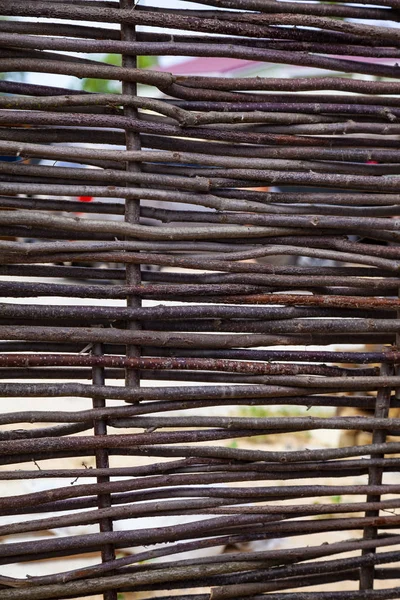 Wooden fence close-up. Wooden background.