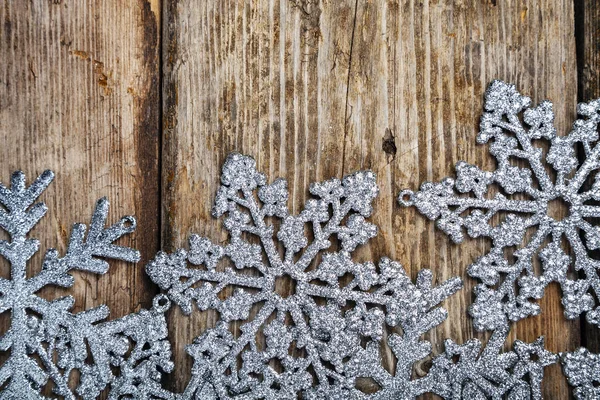 Flocons Neige Argentés Sur Vieux Fond Brun Bois Décor Noël — Photo