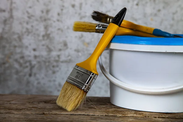 Items Home Office Renovation Gray Wall Paint Can Brush Table — Stock Photo, Image