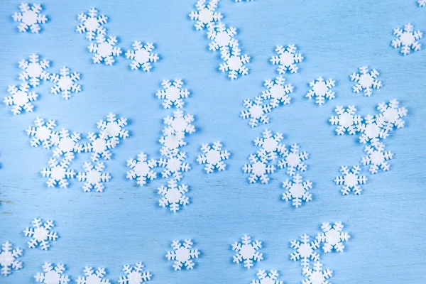 Weihnachten Schneeflocken Auf Blauem Holzgrund — Stockfoto