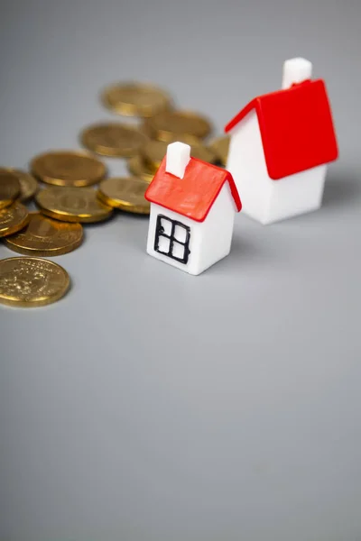 Small Houses Coins Gray Background Buying Selling Real Estate — Stock Photo, Image