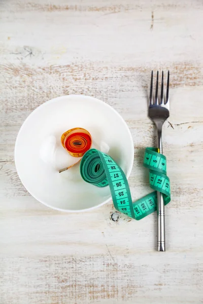 Tenedor, placa y cinta métrica — Foto de Stock