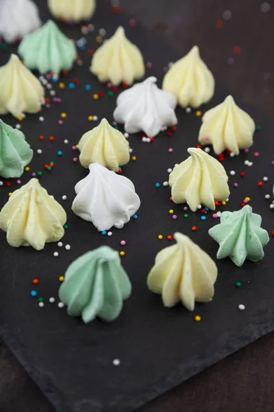 Meringue on a dark background. — Stock Photo, Image