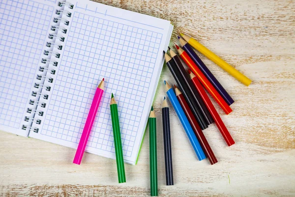 Pencils and notebook. — Stock Photo, Image