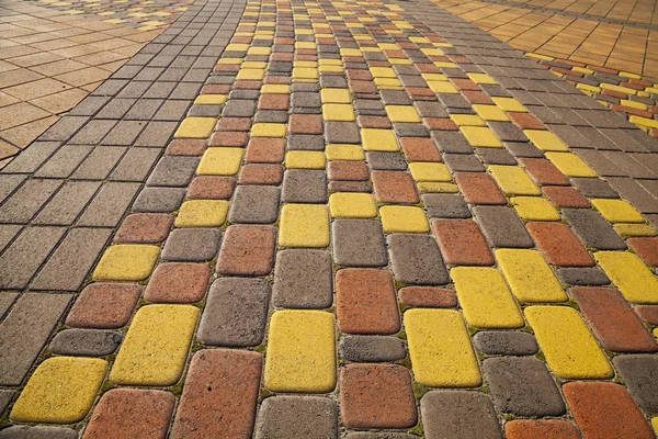 Orange with brown paving slabs — Stock Photo, Image