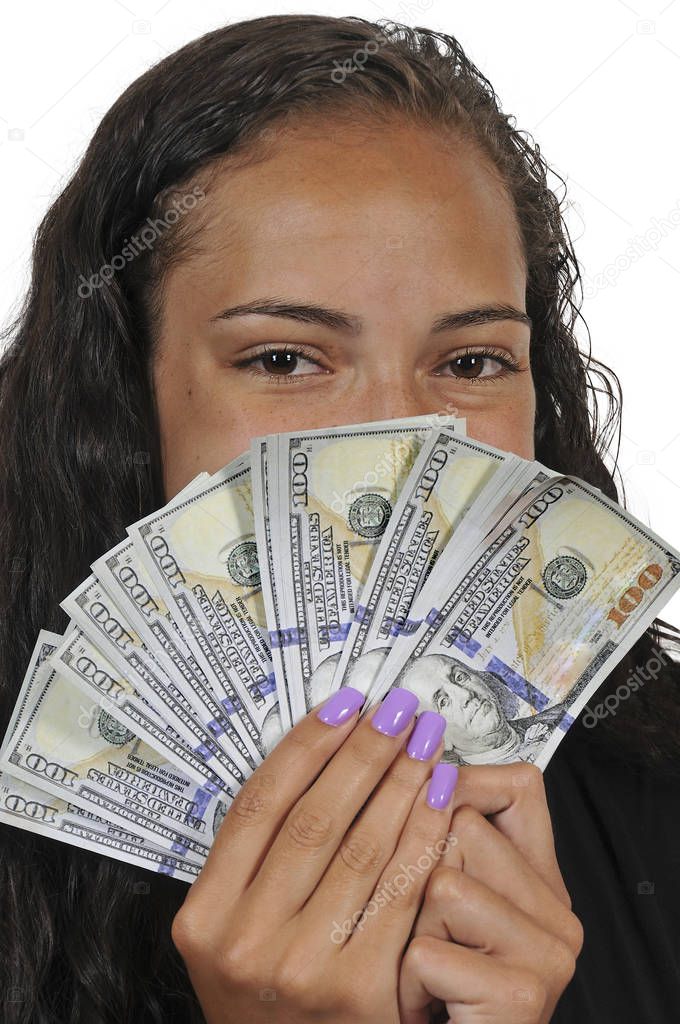 Black African American woman holding a hand full of 100 dollar bills