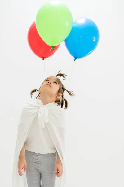 Ragazzo felice con un mucchio di palloncini — Foto Stock