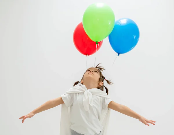 Garçon heureux avec un tas de ballons — Photo