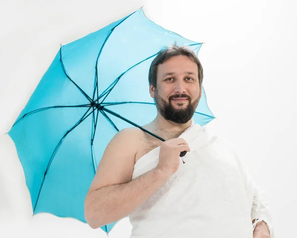 Pèlerin Hadj avec parapluie — Photo