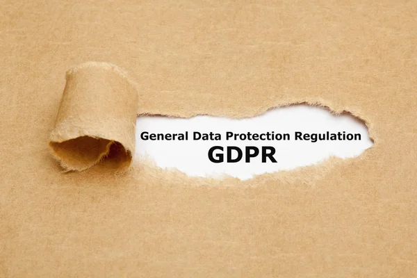 文本一般数据保护规则 Gdpr 出现在撕掉的棕色纸后面 — 图库照片