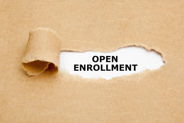 Text Open Enrollment Appearing Torn Brown Paper — Stock Photo, Image