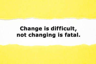 Motivational quote Change is Difficult not Changing is Fatal appearing behind torn yellow paper. Adaptation and flexibility concept. clipart