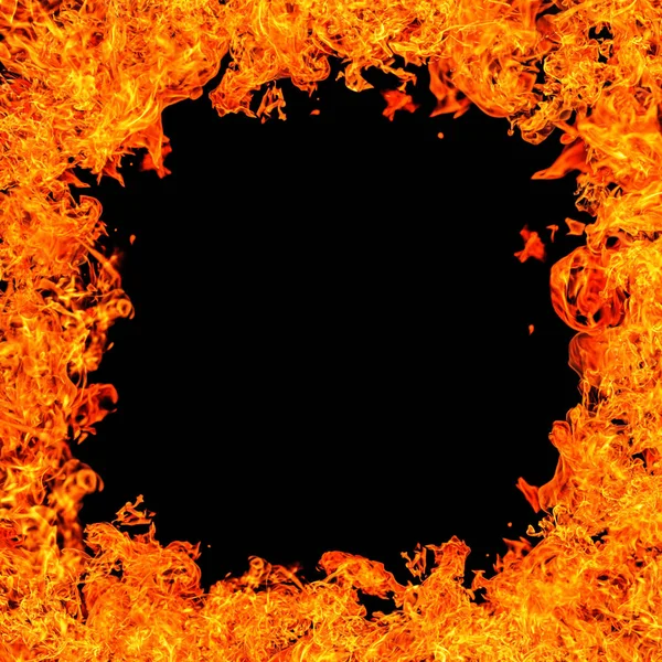 Fire burns on black background — Stock Photo, Image