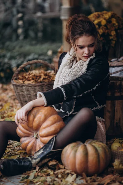 beautiful  Woman in sweater  in  Autumn Garden