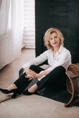 young woman in white shirt in studio
