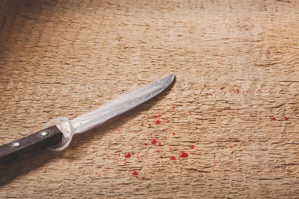 Close Condom Knife Wooden Table Criminal Concept — Stock Photo, Image