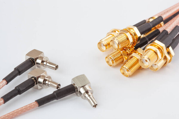 High-frequency ipx to sma female cable connector with gold plated pins. Coaxial cable with connectors for special telecommunication equipment.
