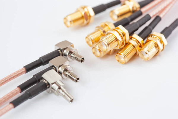 High-frequency ipx to sma female cable connector with gold plated pins. Coaxial cable with connectors for special telecommunication equipment.