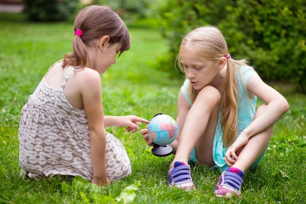 Little Pretty Girls Girlfriends Sitting Lawn Look Glob — Stock Photo, Image