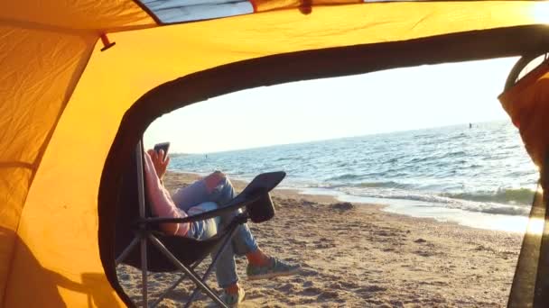 Girl Relaxing Chair Sandy Beach Hiking Tent — Stock Video