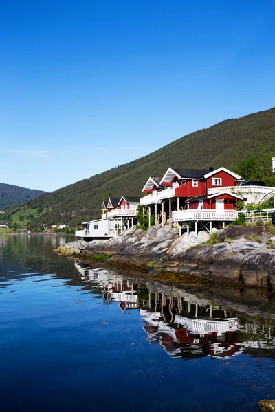 Rorbuer Traditional Norwegian Red Wooden House Stand Lakeside Mountains Distance — Stock Photo, Image