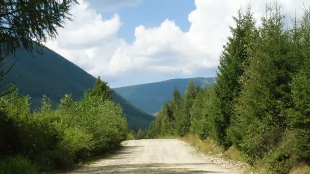 Ground Road Mountains Clouds Running Blue Sky — Stock Video