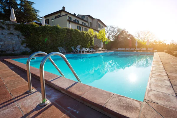 Swimming pool at sunrise — Stock Photo, Image